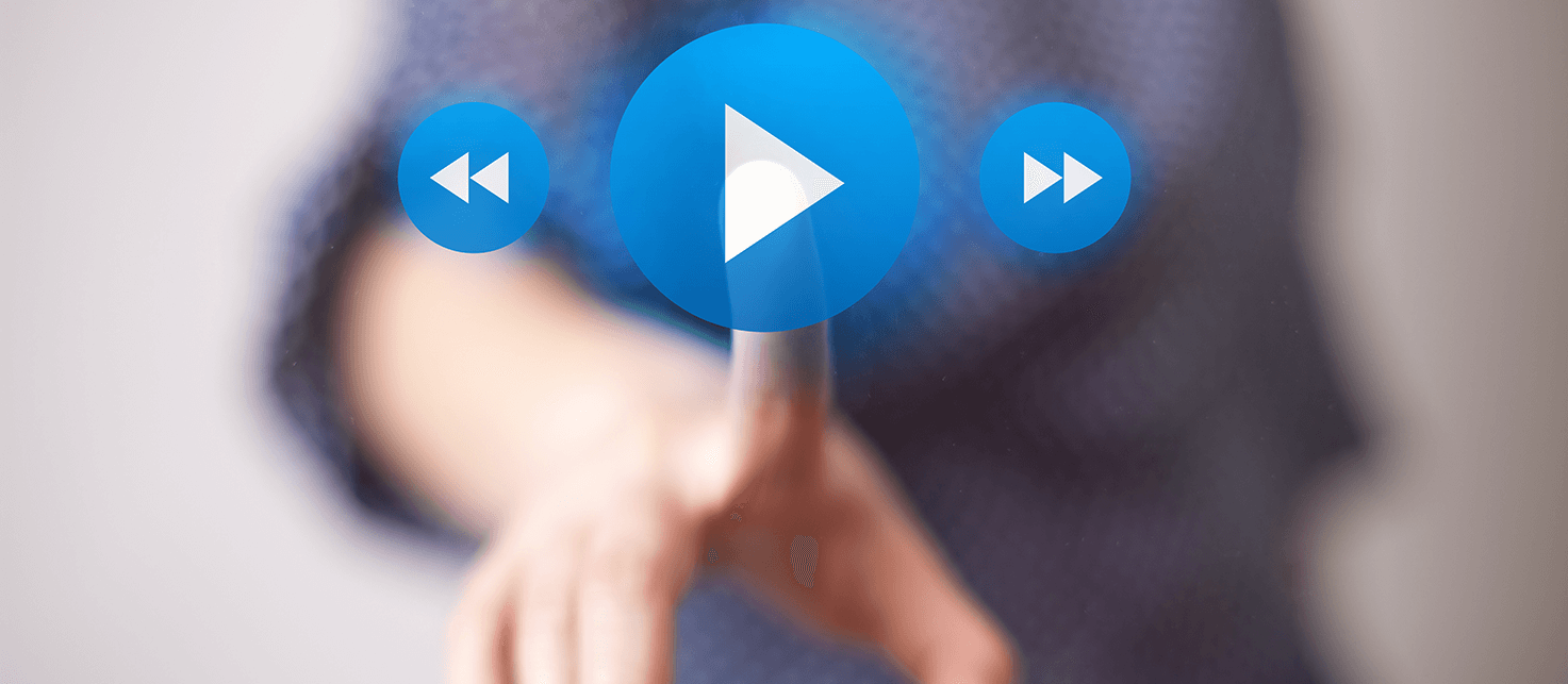 man pressing play button